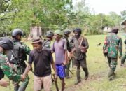 Menjelang Natal, Satgas Yonif 123/Rajawali Laksanakan Karya Bhakti dan Pelayanan Kesehatan di Papua
