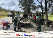 Gotong Royong Satgas Yonif 521/DY Bersama Rakyat Membangun Drainase di Distrik Bolakme