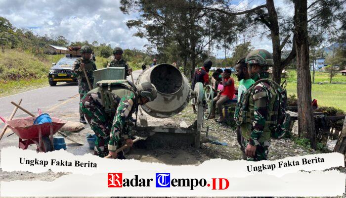 Gotong Royong Satgas Yonif 521/DY Bersama Rakyat Membangun Drainase di Distrik Bolakme