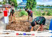Satgas Bersama Warga Paya Besar Bersihkan Sisa Material Pembangunan Jembatan