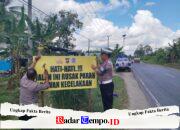 Satlantas Polres Pulang Pisau Pasang Spanduk Peringatan di Jalan Rusak