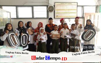 KOTI MPC Pemuda Pancasila Gresik Bagikan Bantuan Seragam dan Sepatu Gratis ke MI Tarbiyatul Banin