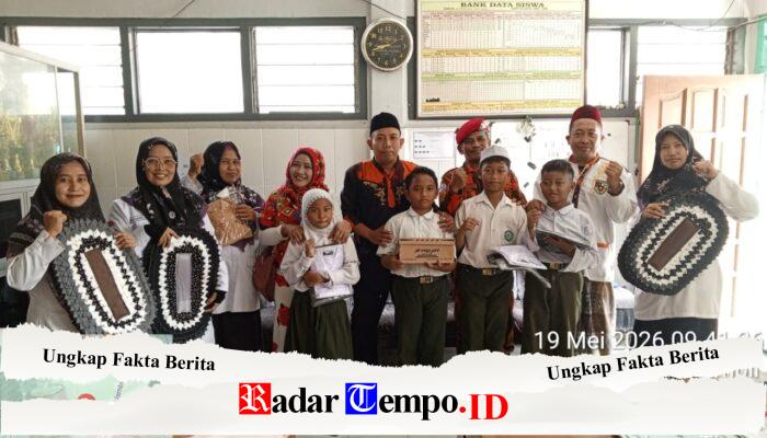 KOTI MPC Pemuda Pancasila Gresik Bagikan Bantuan Seragam dan Sepatu Gratis ke MI Tarbiyatul Banin
