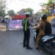 Sinergi Satlantas Polres Pamekasan dan Jasa Raharja Gelar Aksi Simpatik di Simpang 4 Kanginan