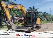 Satgas TMMD Reguler Ke-129 Kawal Alat Berat Ratakan Timbunan Jalan Sasaran Fisik