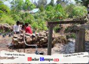Kegembiraan Anak-Anak Desa Tempapan Hulu Terpancar Saat Nikmati Air Bersih dari Sumur Bor Program TMMD Ke-129