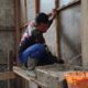 Kejar Target Penyelesaian, Satgas TMMD Reguler Ke-129 Semangat Plester Dinding RTLH