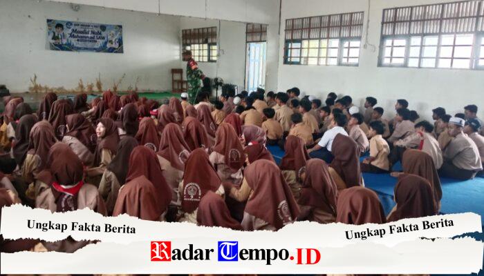 Babinsa Koramil 1002-04/LAS Bina Karakter Pelajar Melalui Kegiatan Kepramukaan